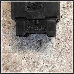 Immagine di Interuttore Luci Emergenza Anteriore Centrale SUZUKI Jimny I 3743059J10000